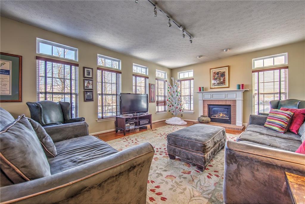 252 Field Club Circle McKees Rocks, PA 15136 - Photo 9 of 24 Family with gas log fireplace...