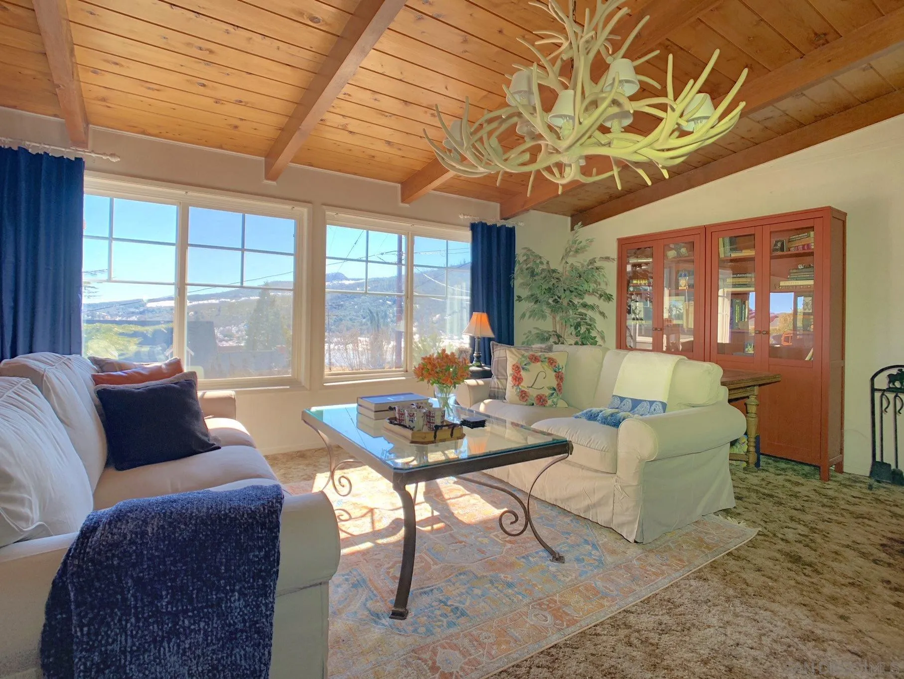 34642 Navajo Road Julian, CA 92036 - Photo 18 of 32 a living room with furniture and a large window