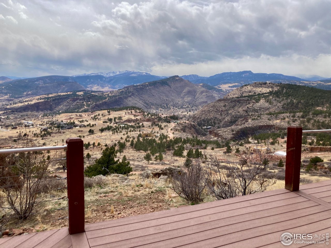 View SW of the foothills and mountains from the main level deck.