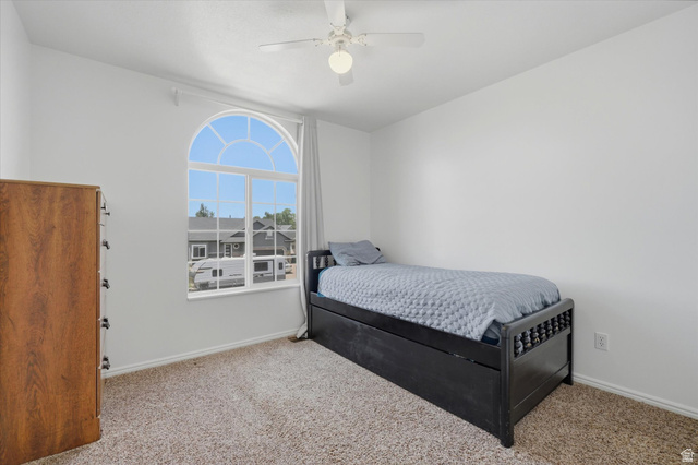 5576 South 4100th Street West Roy, UT 84067 - Photo 23 of 35 Bedroom with arched window