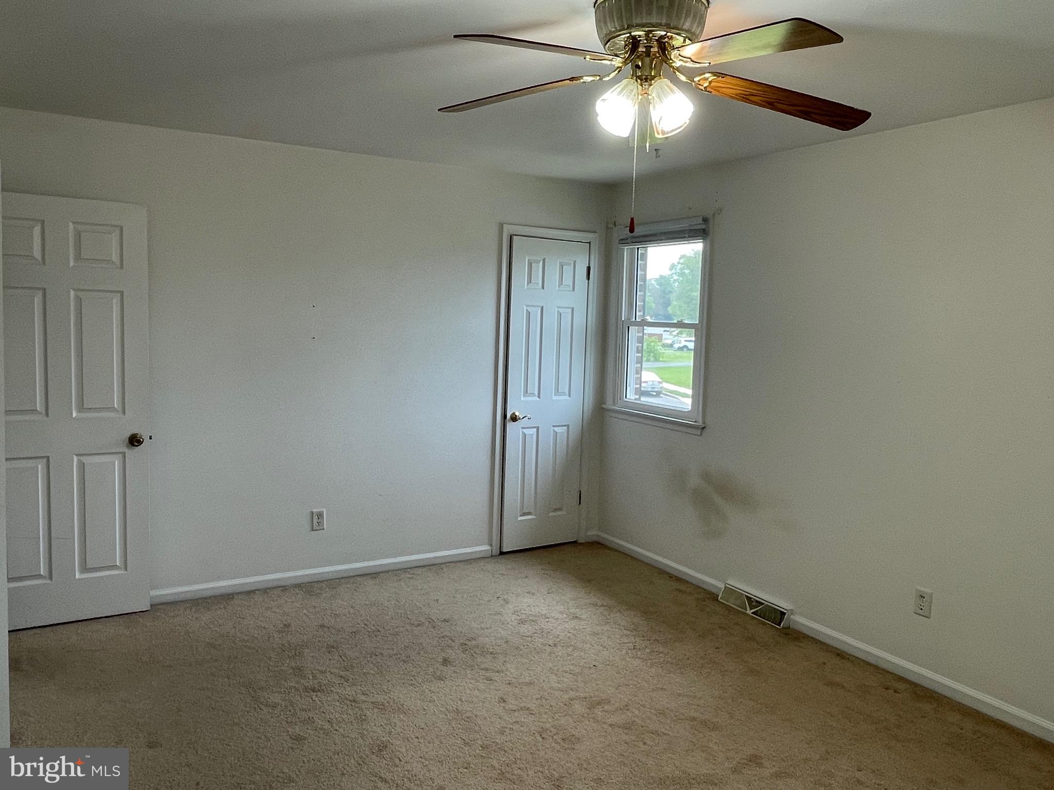 3314 Roxbury Road Hatfield, PA 19440 - Photo 17 of 26 an empty room with closet and windows
