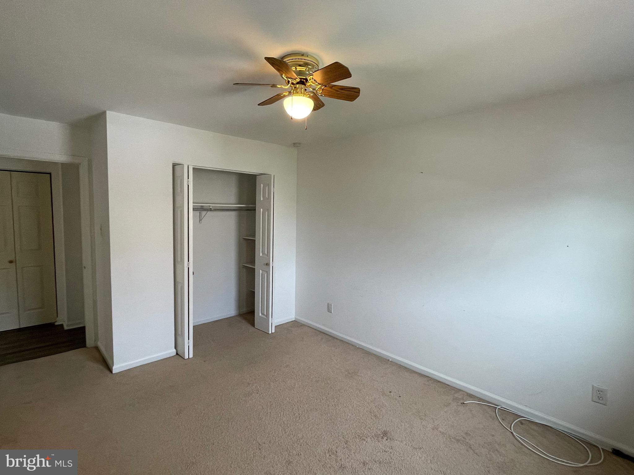 3314 Roxbury Road Hatfield, PA 19440 - Photo 18 of 26 an empty room with closet and a chandelier fan