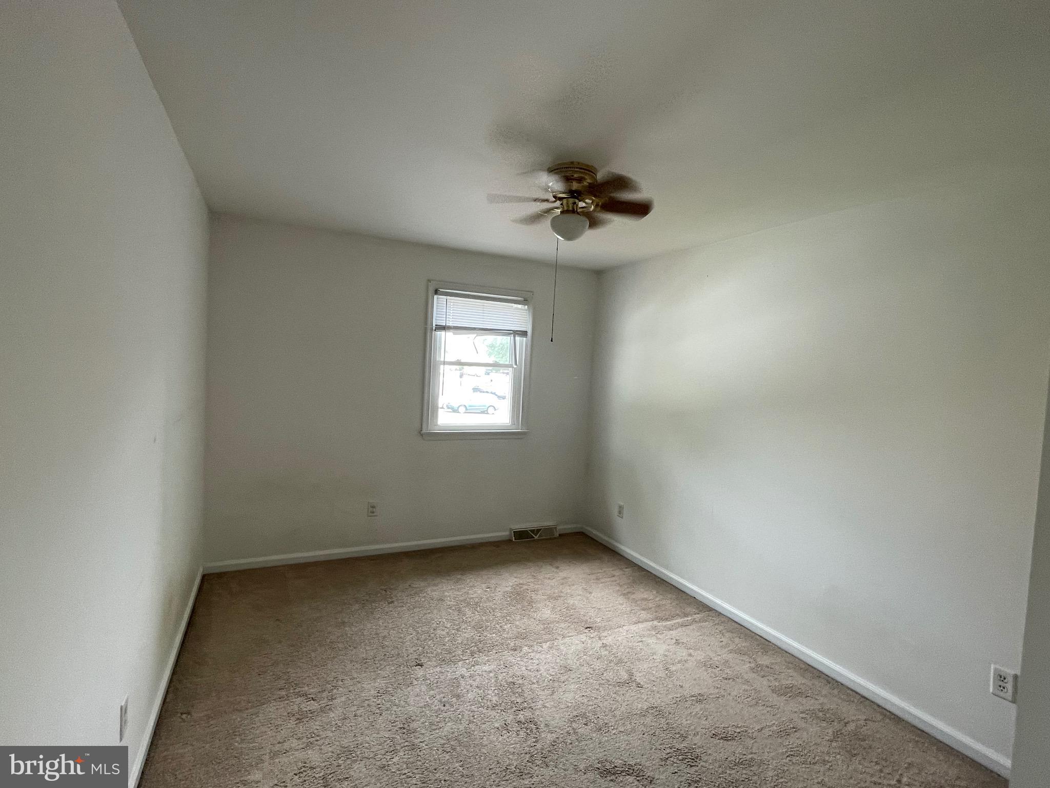 3314 Roxbury Road Hatfield, PA 19440 - Photo 21 of 26 an empty room with windows and fan