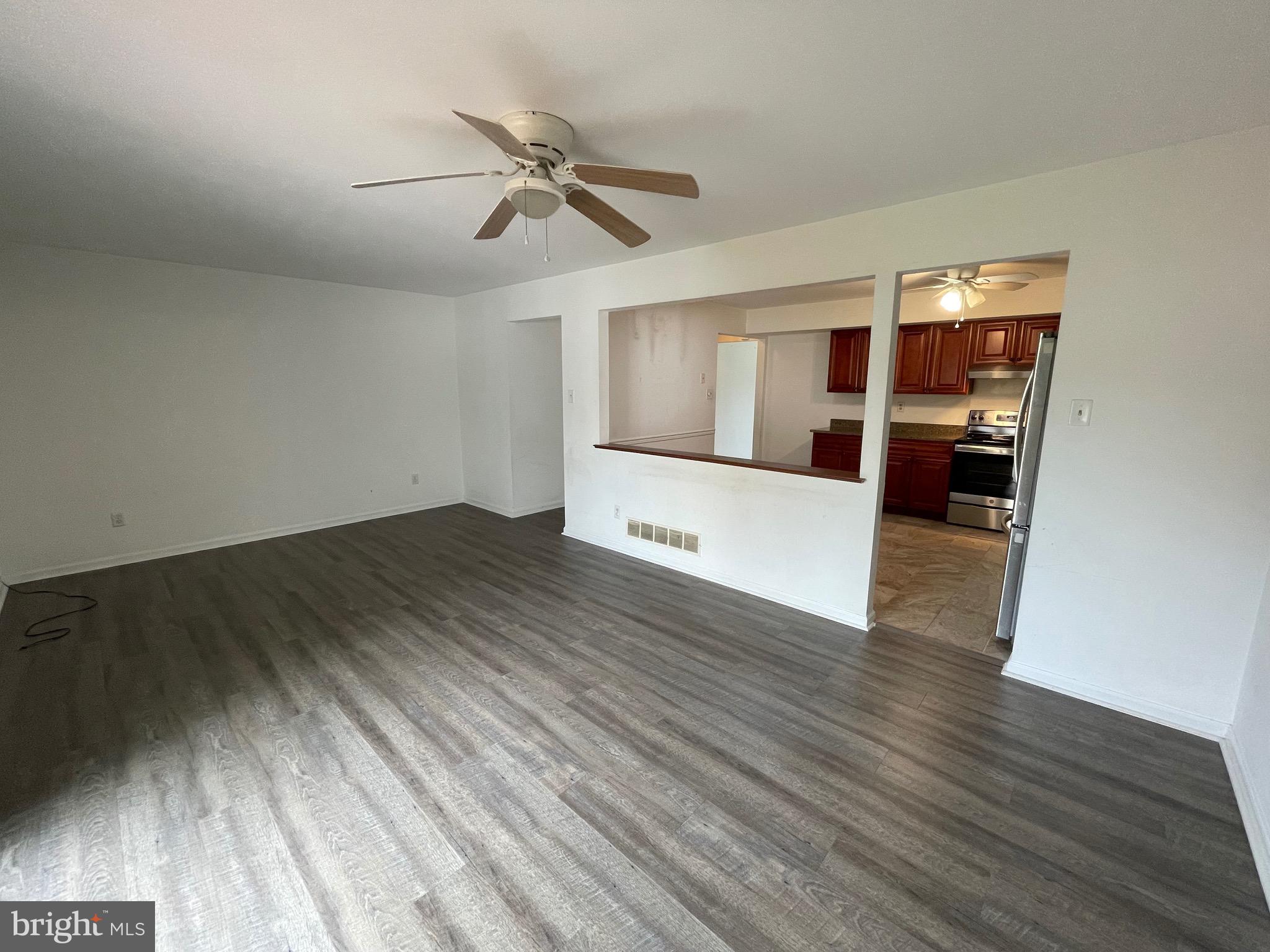 3314 Roxbury Road Hatfield, PA 19440 - Photo 5 of 26 wooden floor in an empty room with a window