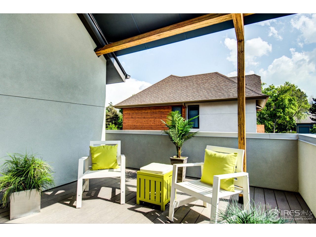 3959 Springleaf Lane Boulder, CO 80304 - Photo 15 of 25 a balcony with table and chairs