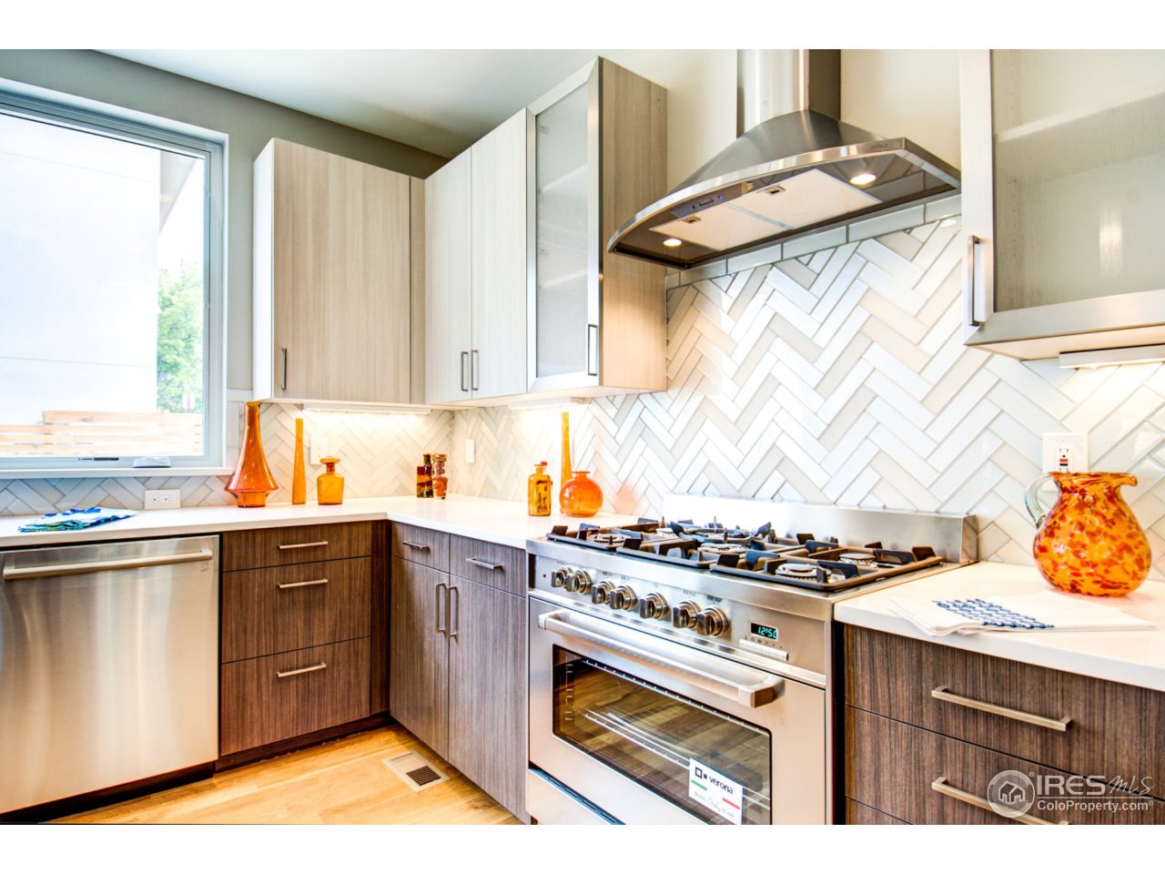 3959 Springleaf Lane Boulder, CO 80304 - Photo 5 of 25 a kitchen with a stove and a sink
