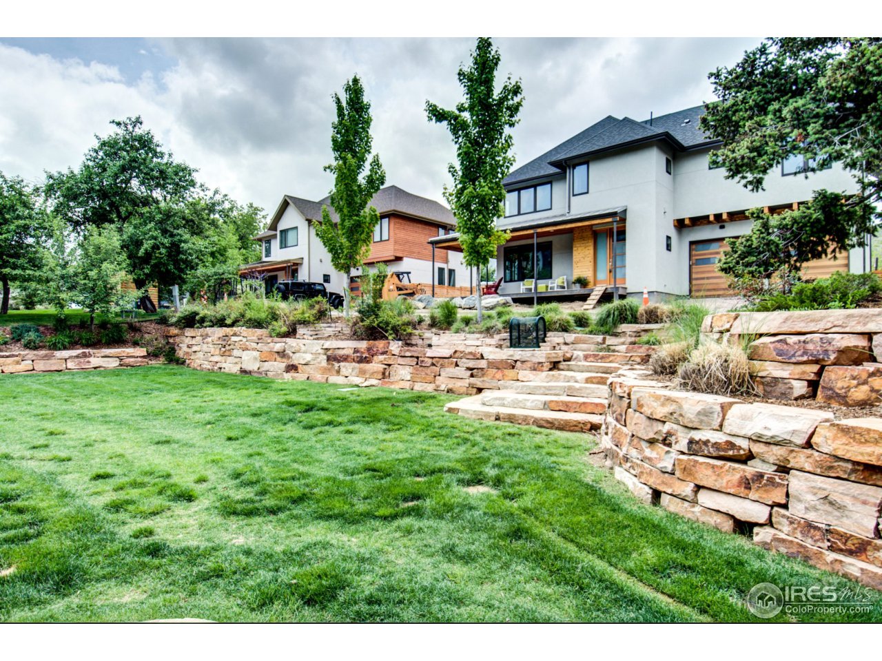 3959 Springleaf Lane Boulder, CO 80304 - Photo 6 of 25 a front view of a house with garden