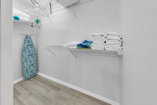 a bathroom with a tub and shower