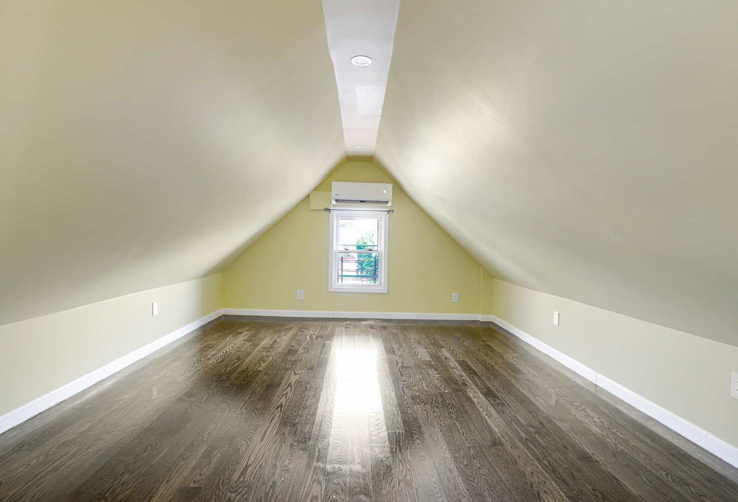 144-38 87th Avenue, Unit 2 Queens, NY 11435 - Photo 13 of 14 a view of an empty room and wooden floor
