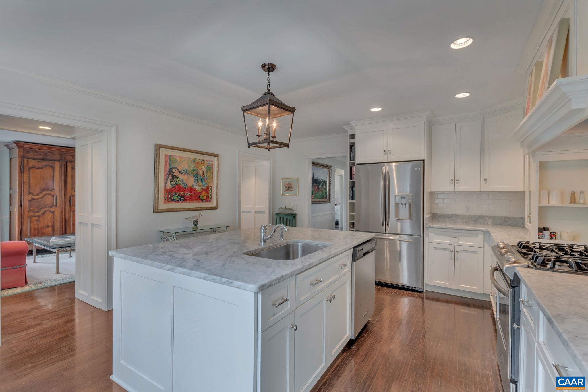 1815 Winston Road Charlottesville, VA 22903 - Photo 18 of 65 a kitchen with stainless steel appliances granite countertop a sink stove and refrigerator