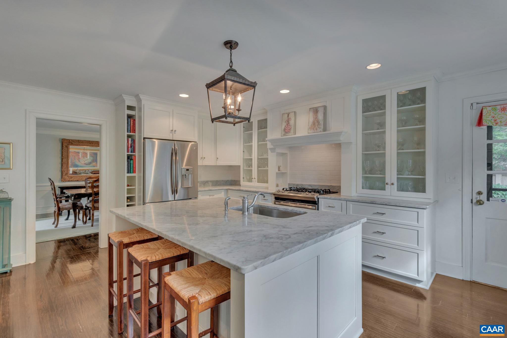 1815 Winston Road Charlottesville, VA 22903 - Photo 19 of 65 a kitchen with stainless steel appliances granite countertop a kitchen island a stove and a sink
