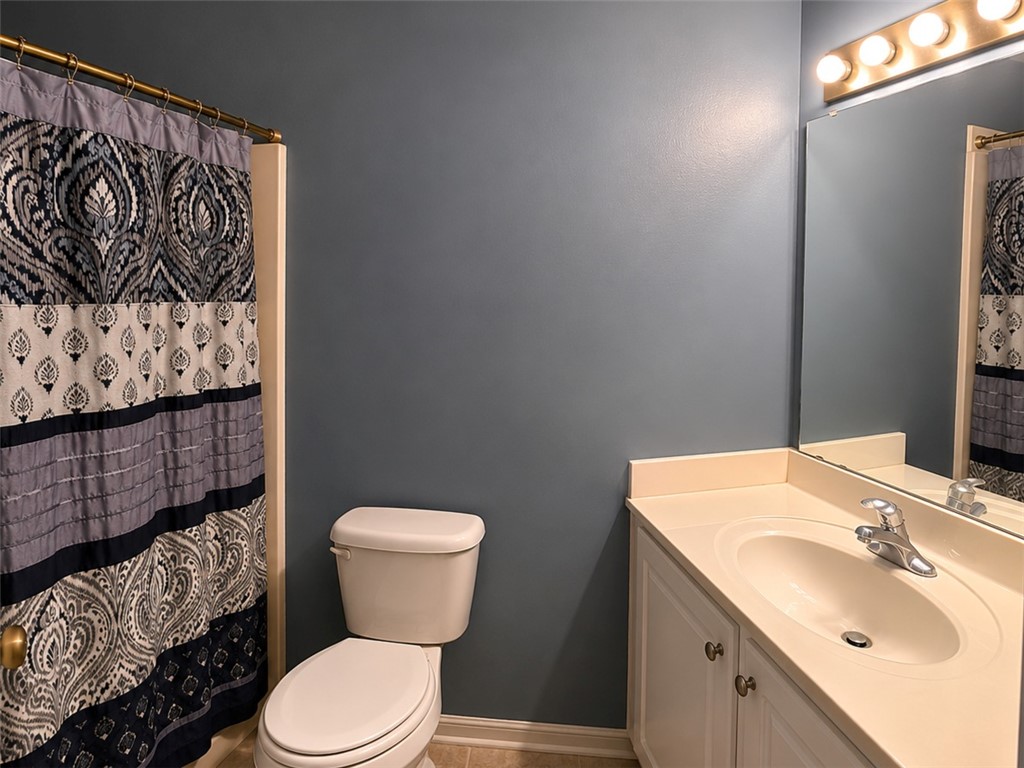328 Springfield Circle Easley, SC 29642 - Photo 27 of 29 Functional full bathroom featuring a convenient vanity with integrated sink and mirror.