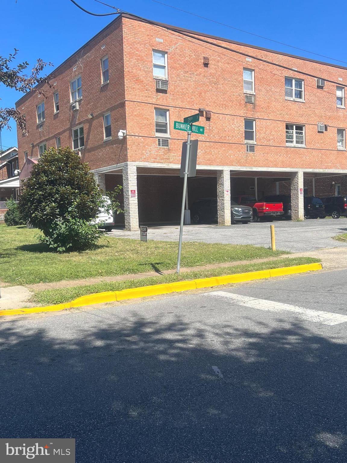 4001 29th Street, Unit 202 Mount Rainier, MD 20712 - Photo 7 of 7 a view of an swimming pool with a lawn chairs