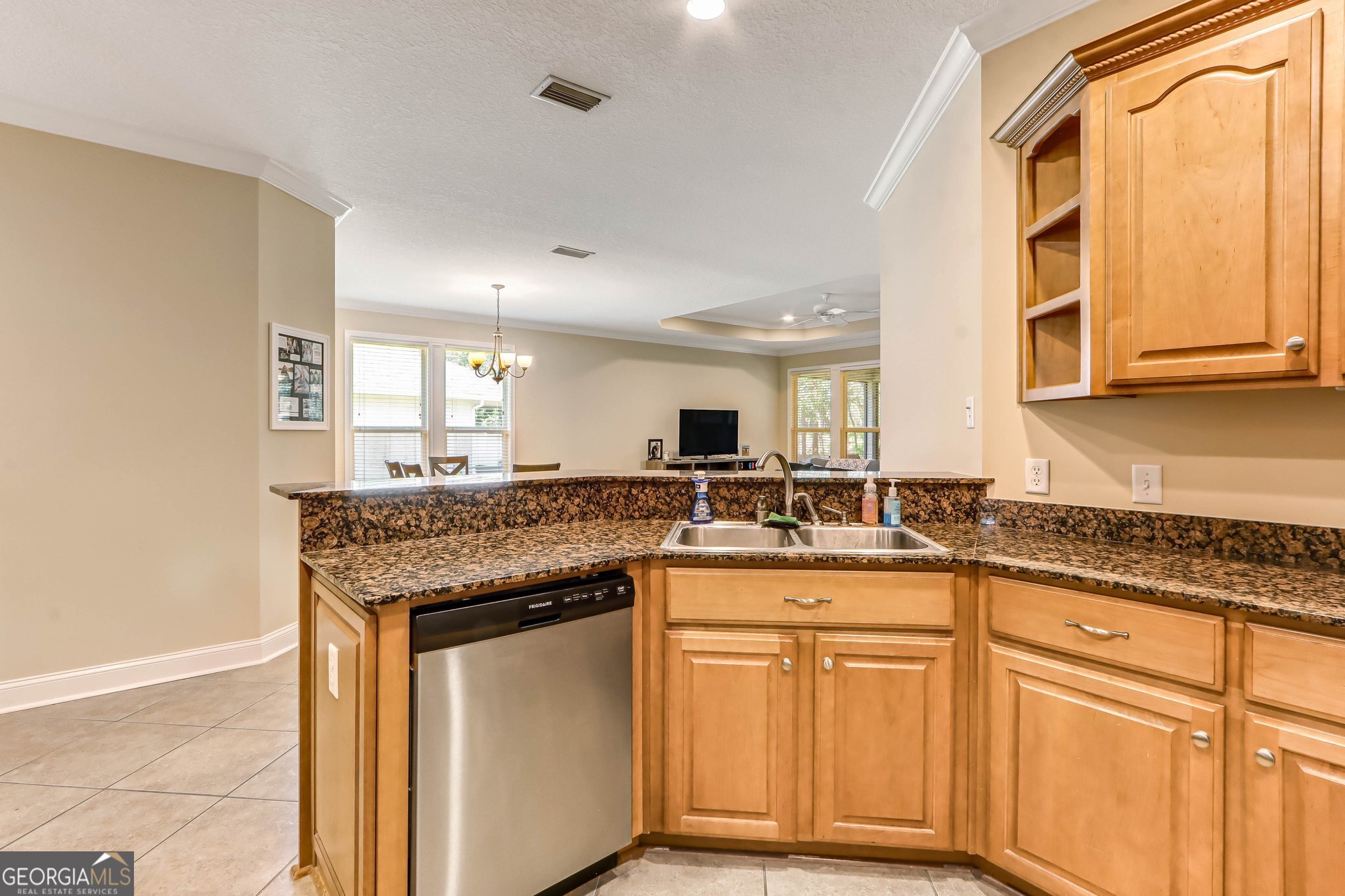 601 Eagle Boulevard Kingsland, GA 31548 - Photo 12 of 41 a kitchen with granite countertop cabinets stainless steel appliances and a counter space