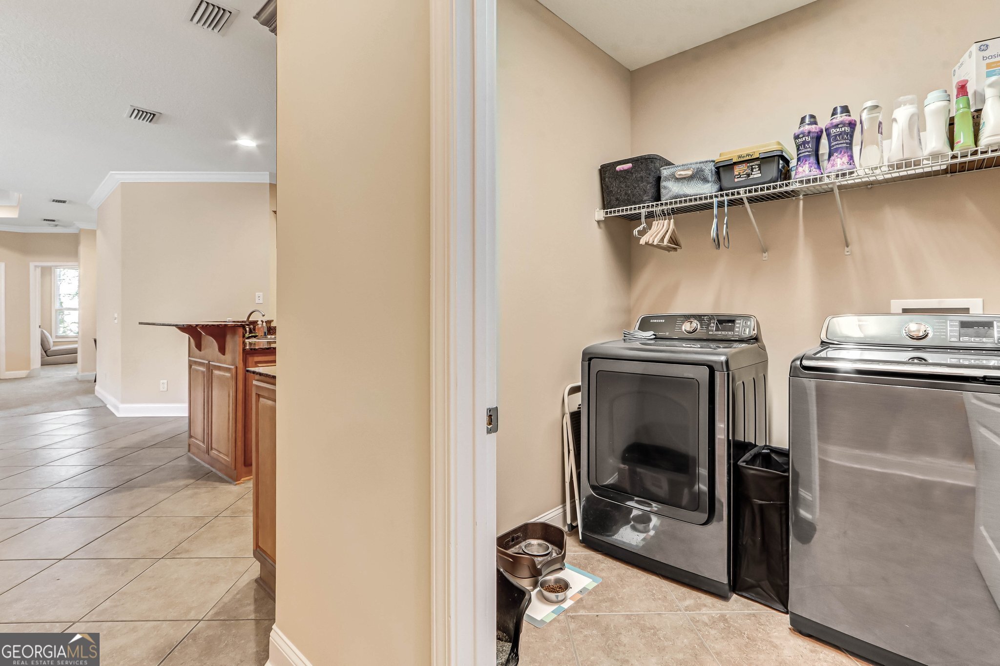 601 Eagle Boulevard Kingsland, GA 31548 - Photo 13 of 41 a view of a kitchen with fridge and workspace
