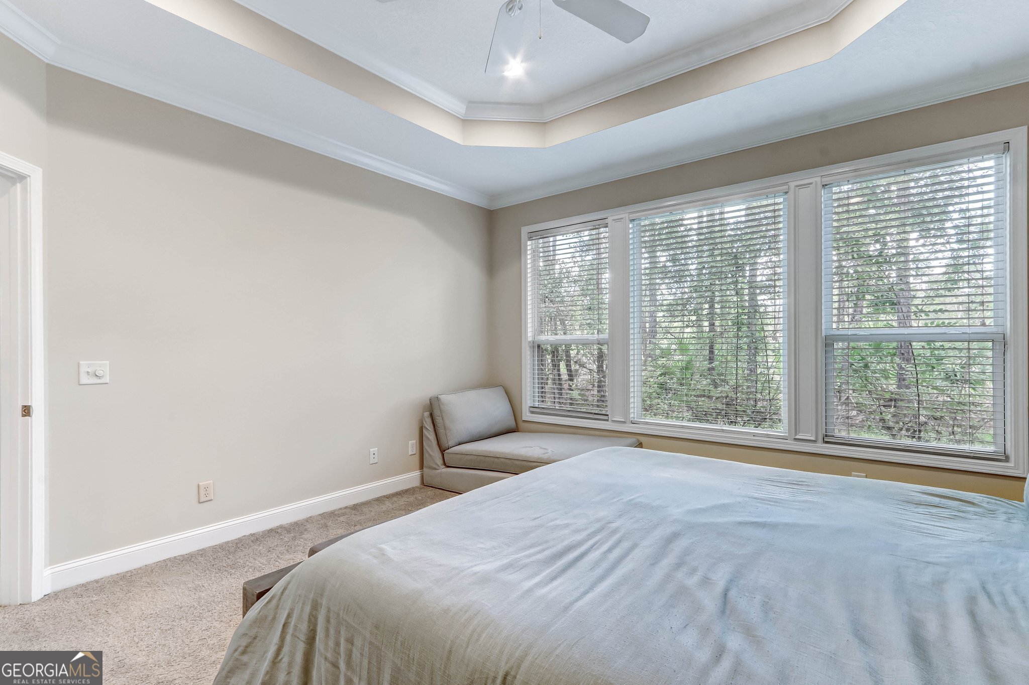 601 Eagle Boulevard Kingsland, GA 31548 - Photo 20 of 41 a bedroom with a bed and a large window