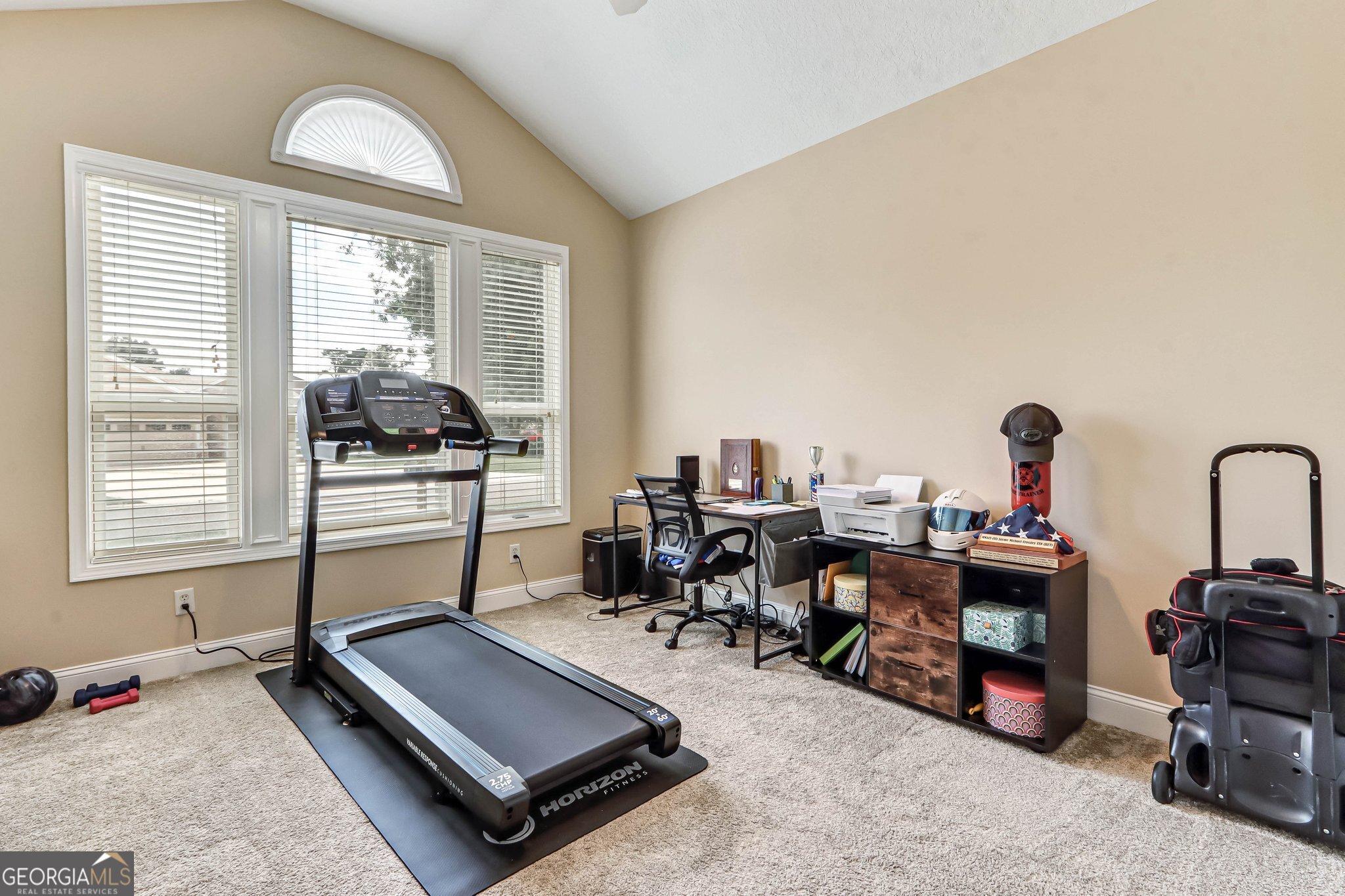 601 Eagle Boulevard Kingsland, GA 31548 - Photo 23 of 41 a living room with furniture a window and a flat screen tv