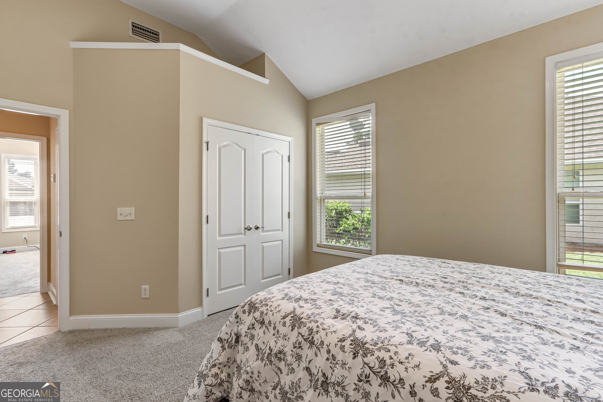 601 Eagle Boulevard Kingsland, GA 31548 - Photo 26 of 41 a bedroom with a bed and a window