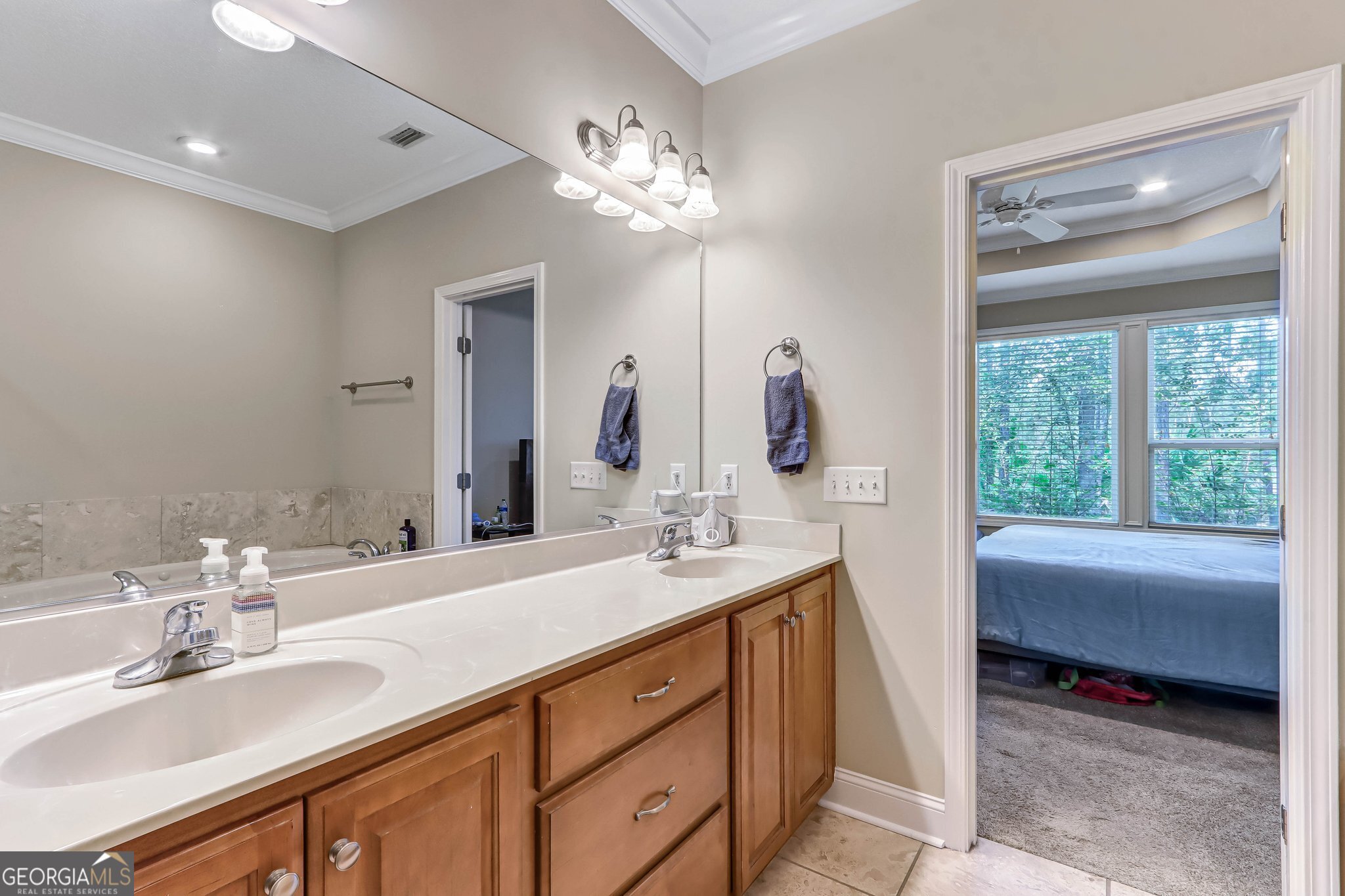 601 Eagle Boulevard Kingsland, GA 31548 - Photo 27 of 41 a bathroom with a double vanity sink and a mirror