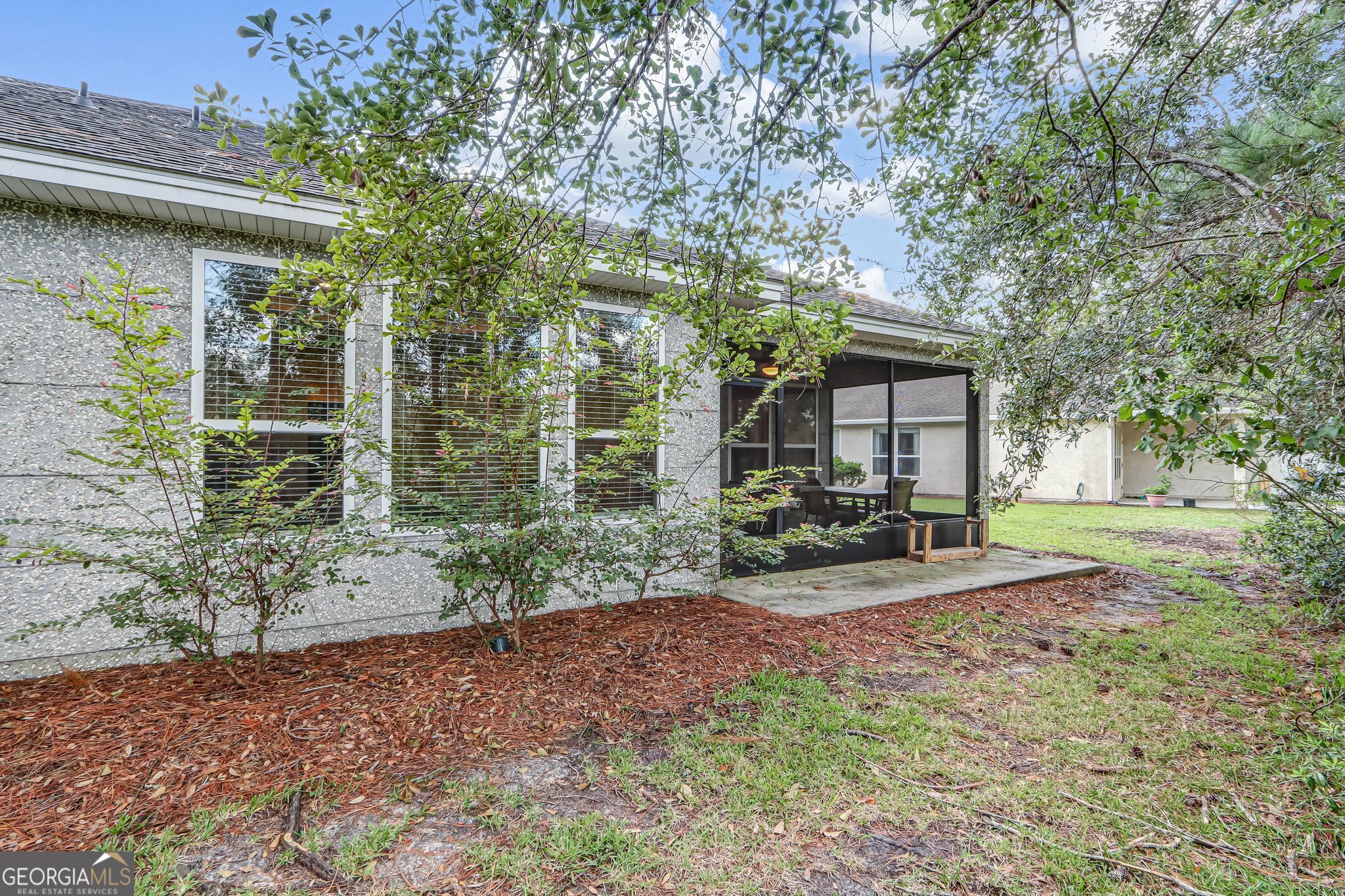 601 Eagle Boulevard Kingsland, GA 31548 - Photo 31 of 41 a view of a house with backyard and a tree