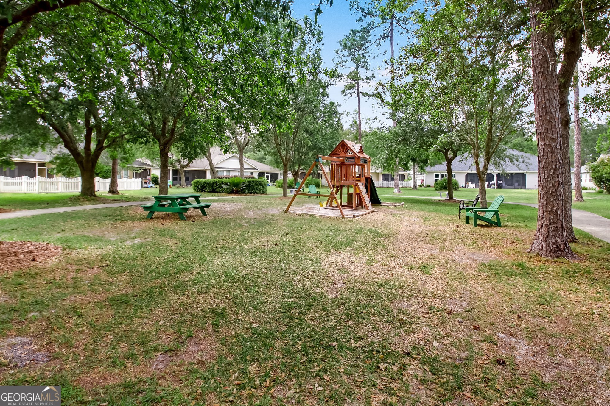 601 Eagle Boulevard Kingsland, GA 31548 - Photo 36 of 41 a view of a park with swings and a tree