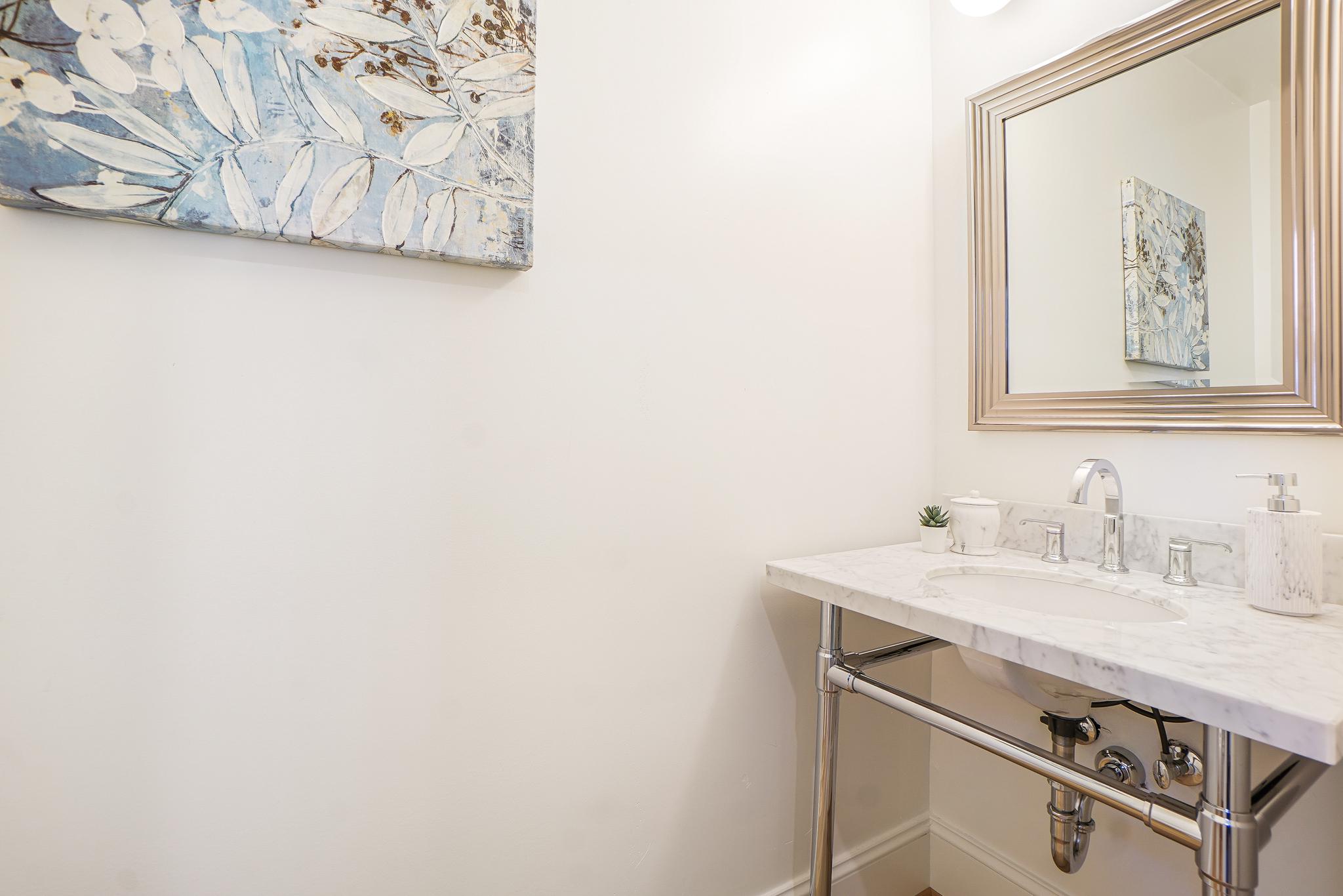 4317 Windom Place Northwest Washington, DC 20016 - Photo 20 of 50 Half bath off mudroom, hall tree, & exterior door!