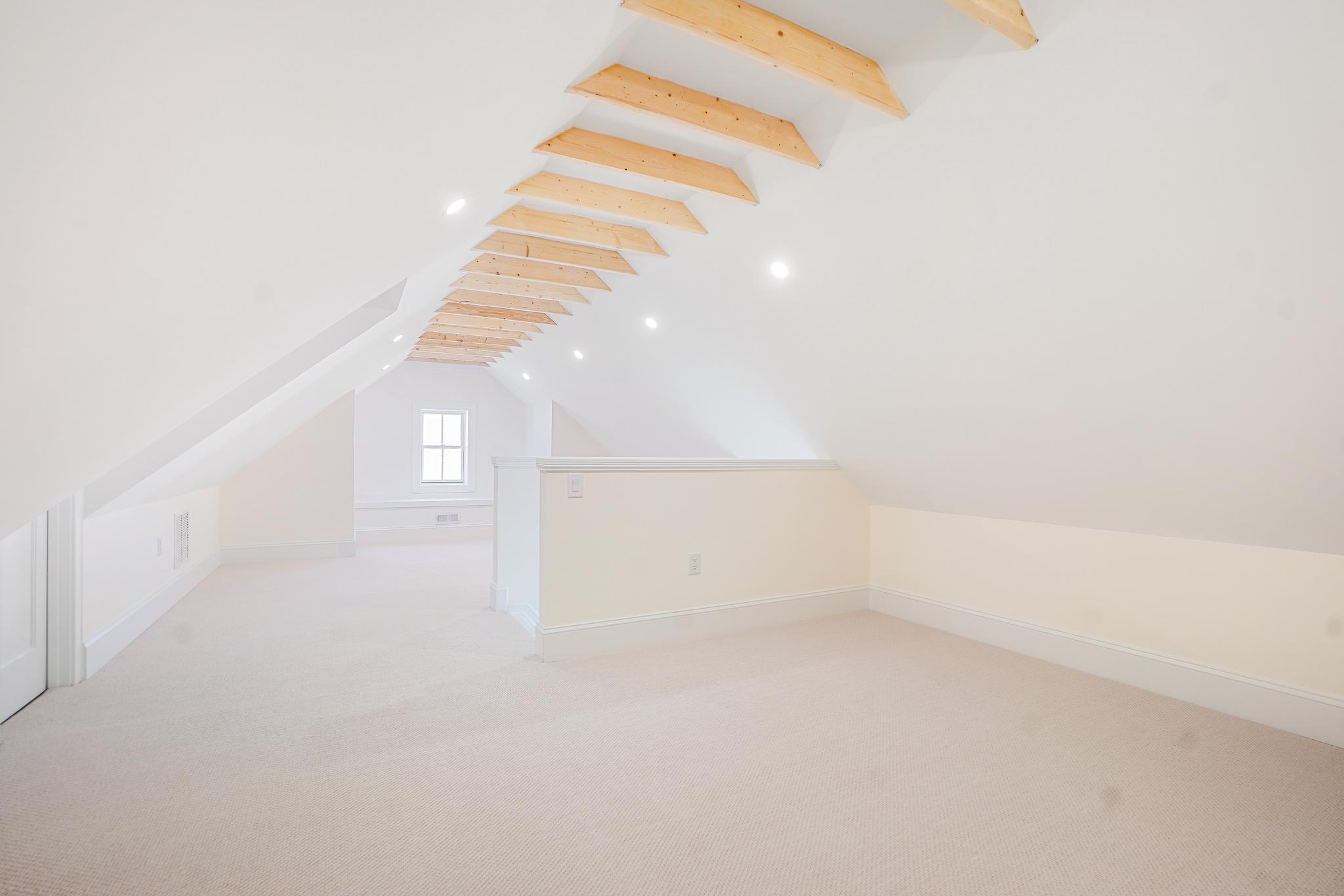 4317 Windom Place Northwest Washington, DC 20016 - Photo 38 of 50 Bright carpeted loft, high gable, exposed trusses!
