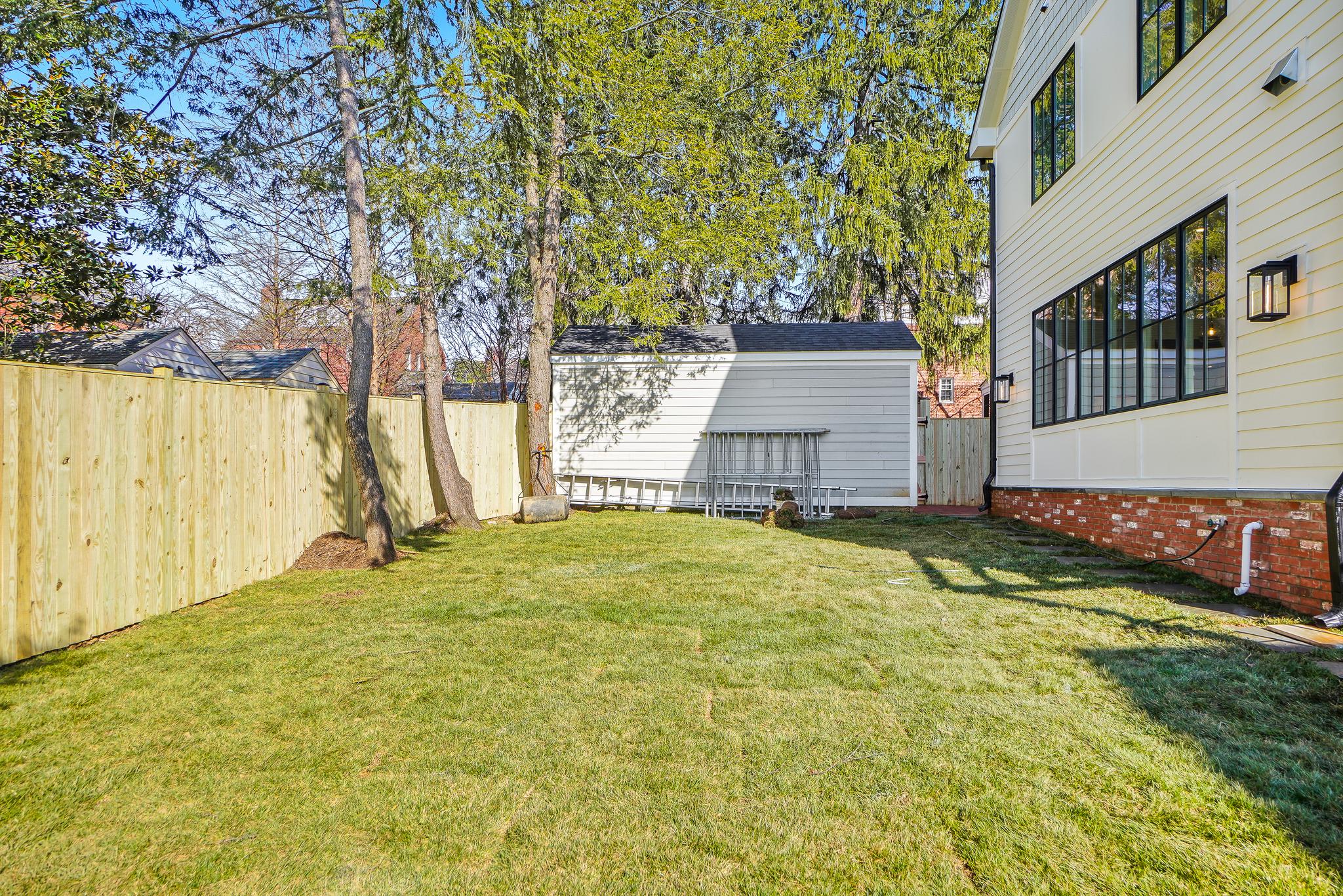 4317 Windom Place Northwest Washington, DC 20016 - Photo 44 of 50 Fab level backyard, priv fence, new tall garage!