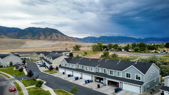 562 Hal Street, Unit 152 Tooele, UT 84074 - Photo 1 of 44 Modern townhome community featuring multi-level residences with attached garages