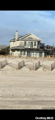 a view of spacious white house