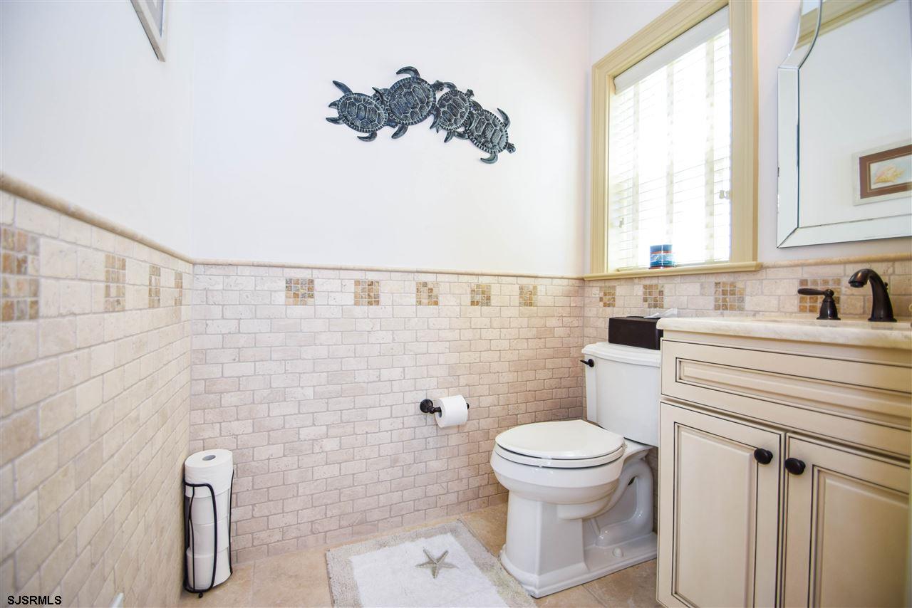 11 South 31st Avenue Longport, NJ 08403 - Photo 8 of 25 a bathroom with a toilet and a sink