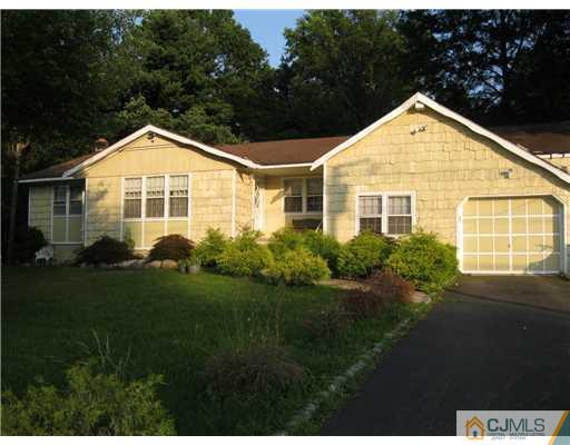 1101 New Dover Road Edison, NJ 08820 - Photo 7 of 7 a front view of a house with a yard