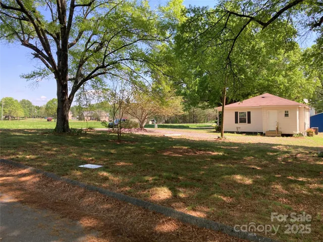 a house with trees in front of it
