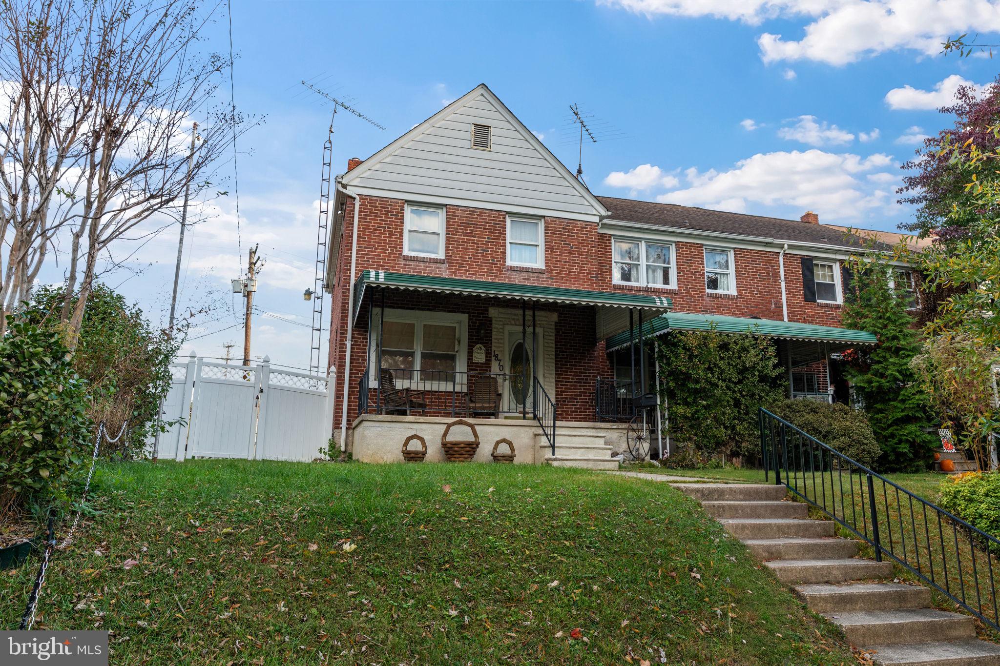 1870 Yakona Road Baltimore, MD 21234 - Photo 1 of 31 a front view of a house with a yard and green space
