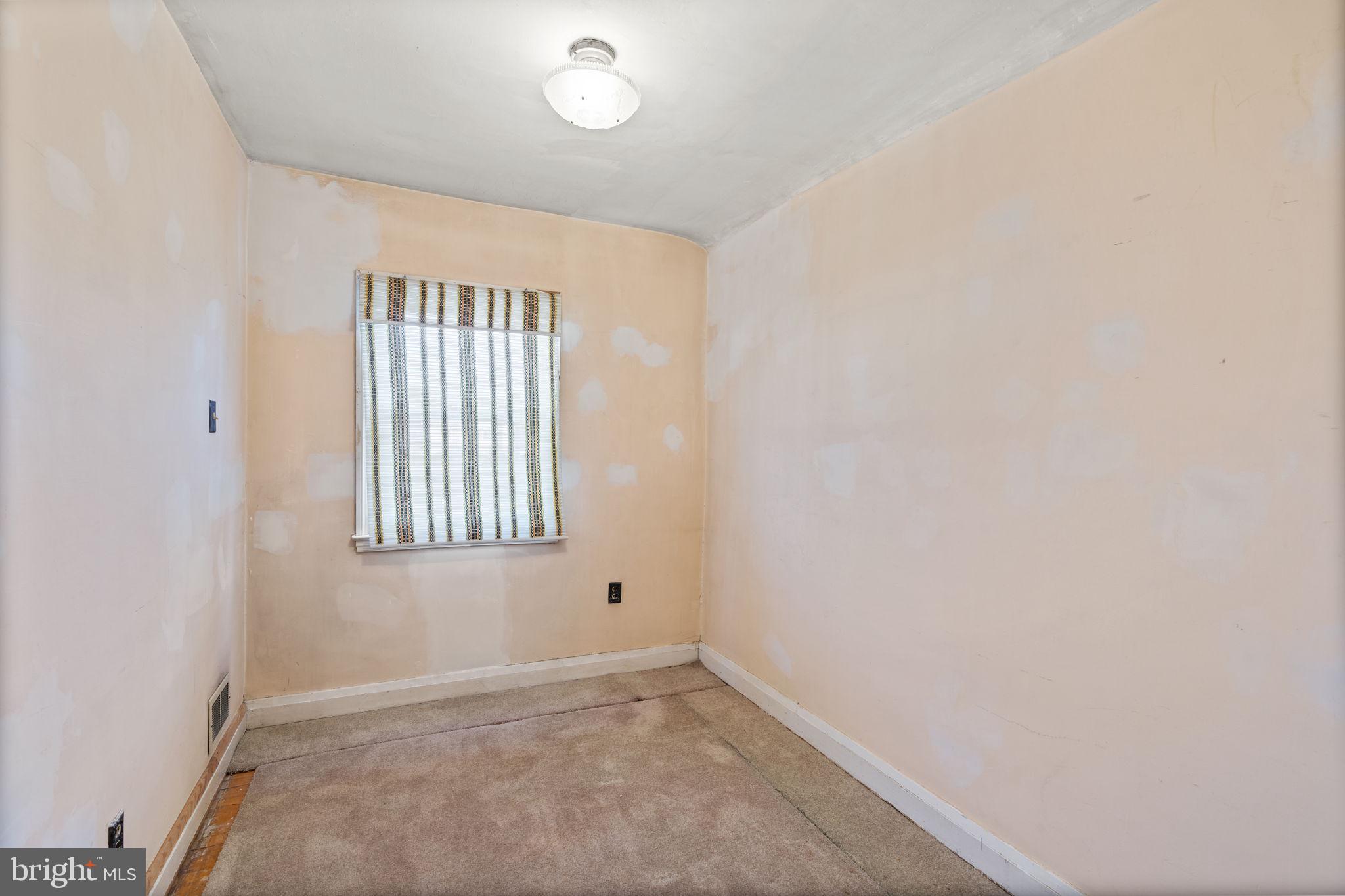 1870 Yakona Road Baltimore, MD 21234 - Photo 18 of 31 an empty room with a window