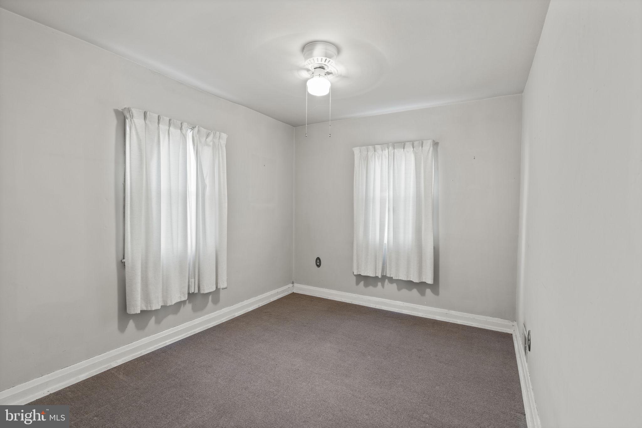 1870 Yakona Road Baltimore, MD 21234 - Photo 20 of 31 an empty room with a empty space and windows