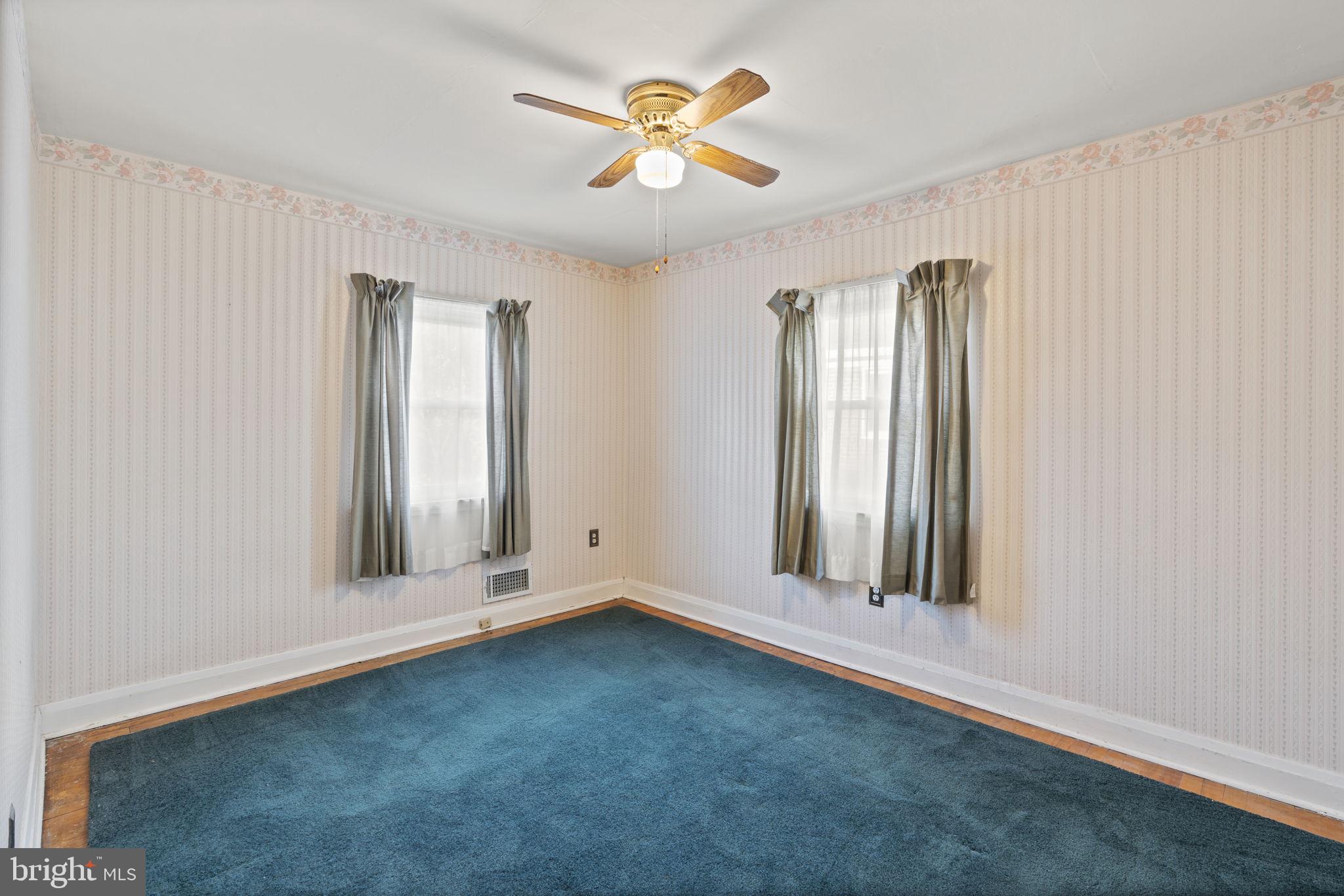 1870 Yakona Road Baltimore, MD 21234 - Photo 22 of 31 an empty room with windows and fan