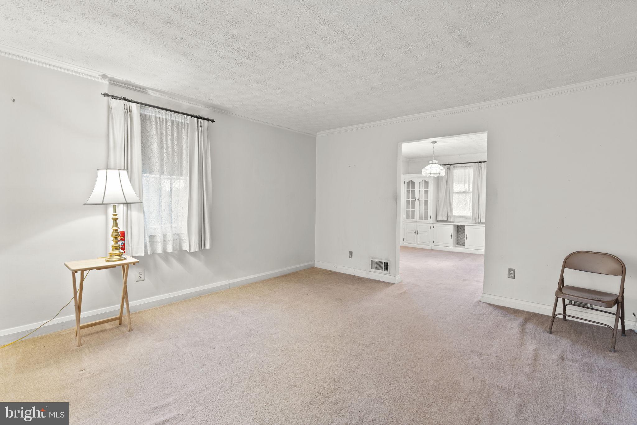 1870 Yakona Road Baltimore, MD 21234 - Photo 5 of 31 a view of an empty room with a window