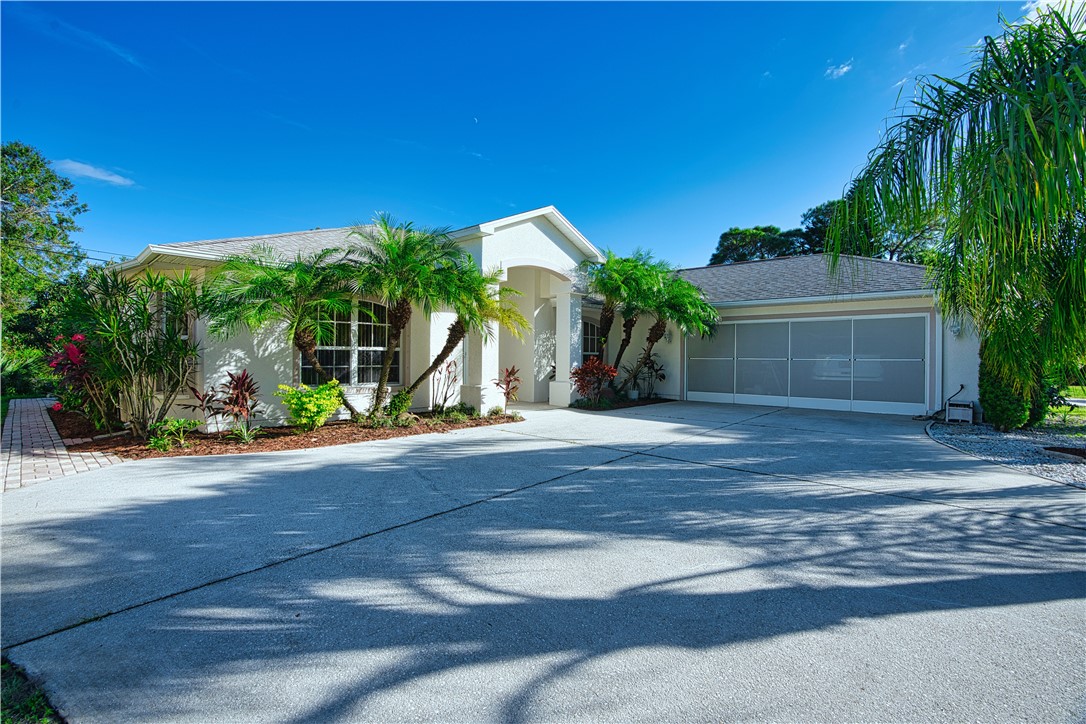 173 Easy Street Sebastian, FL 32958 - Photo 1 of 35 a view of a house and a yard