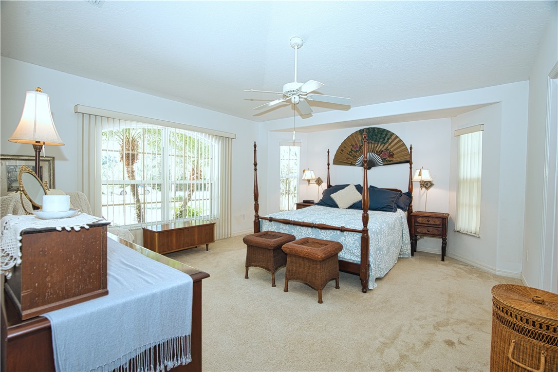 173 Easy Street Sebastian, FL 32958 - Photo 14 of 35 a living room with furniture piano and a window