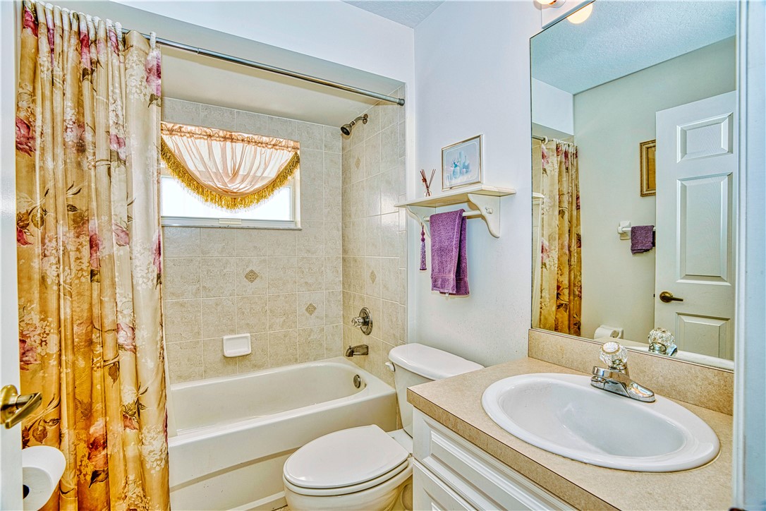 173 Easy Street Sebastian, FL 32958 - Photo 24 of 35 a bathroom with a sink and a mirror