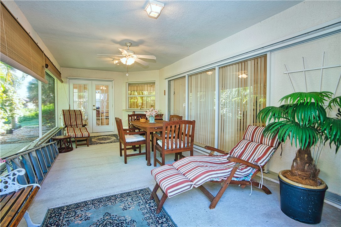 173 Easy Street Sebastian, FL 32958 - Photo 30 of 35 a living room with furniture and a potted plant