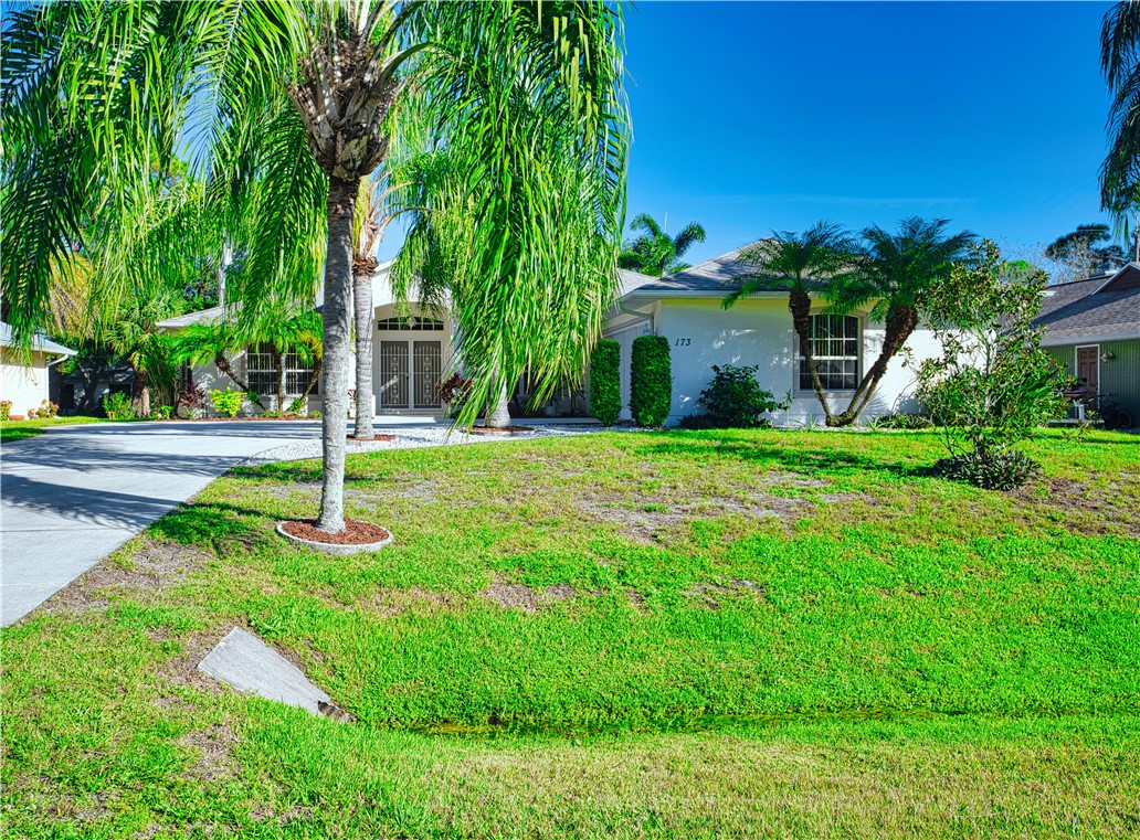 173 Easy Street Sebastian, FL 32958 - Photo 35 of 35 a front view of a house with a yard and tree