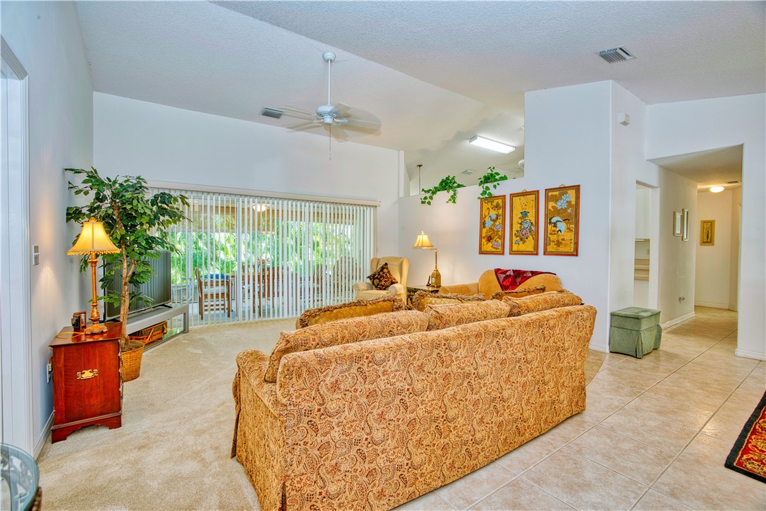 173 Easy Street Sebastian, FL 32958 - Photo 6 of 35 a living room with furniture and a flat screen tv