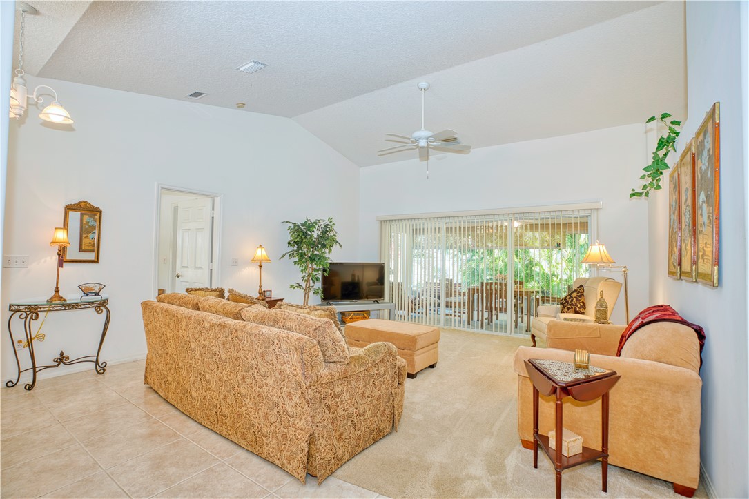 173 Easy Street Sebastian, FL 32958 - Photo 8 of 35 a living room with furniture fireplace and flat screen tv