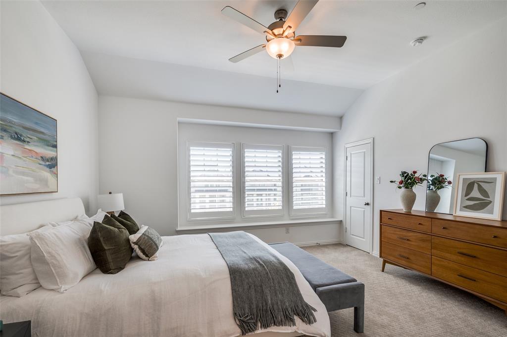 3718 Pelican Rst Way Arlington, TX 76005 - Photo 17 of 40 a bed room with a bed and a dresser