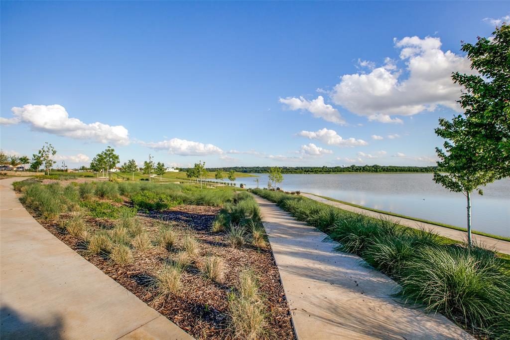 3718 Pelican Rst Way Arlington, TX 76005 - Photo 29 of 40 a view of a lake with a big yard