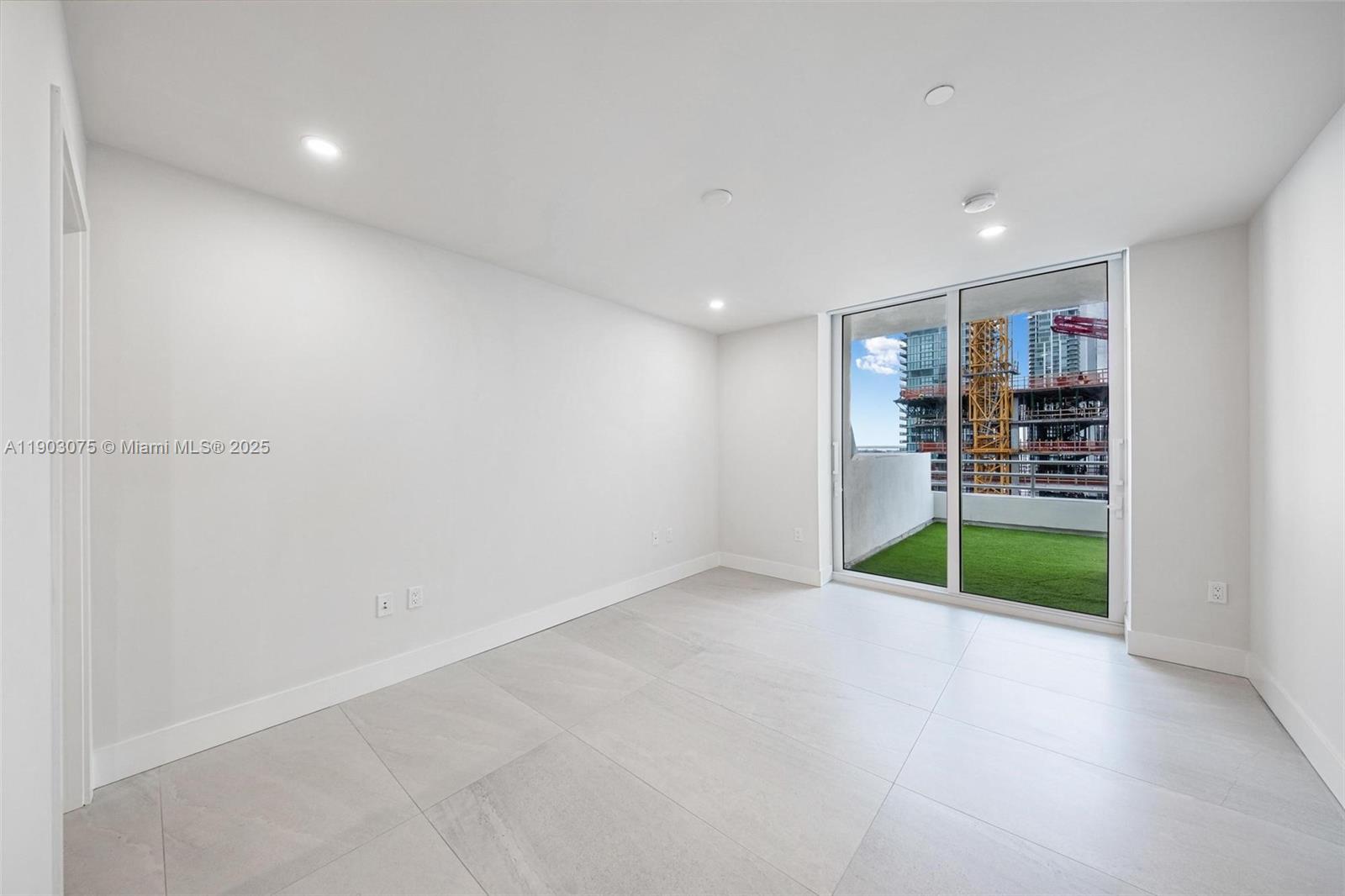 555 Northeast 34th Street, Unit PH3 Miami, FL 33137 - Photo 26 of 51 a view of a room with natural light