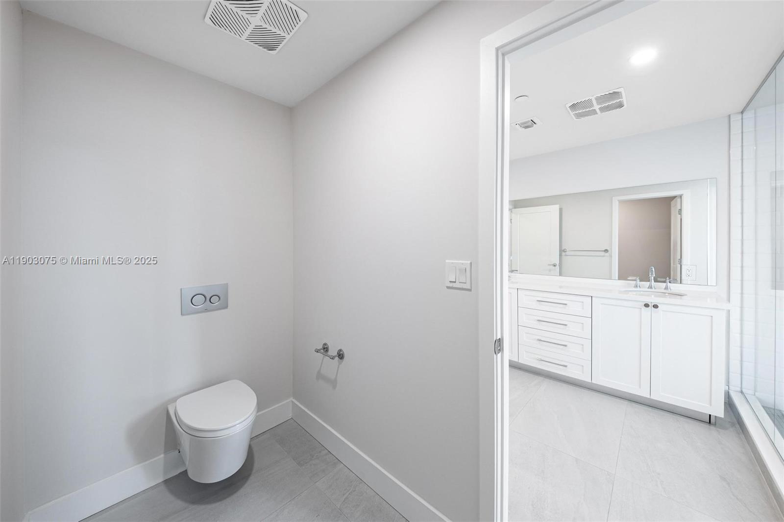 555 Northeast 34th Street, Unit PH3 Miami, FL 33137 - Photo 31 of 51 a bathroom with a toilet