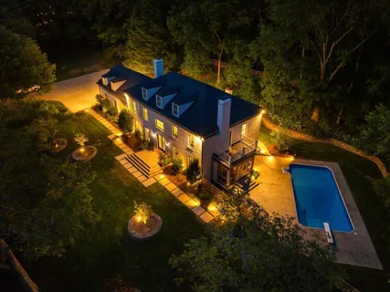 an aerial view of a house with garden space